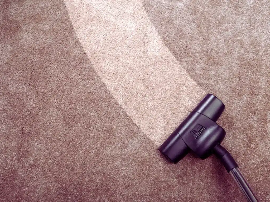 vacuum cleaning dirty carpet floor